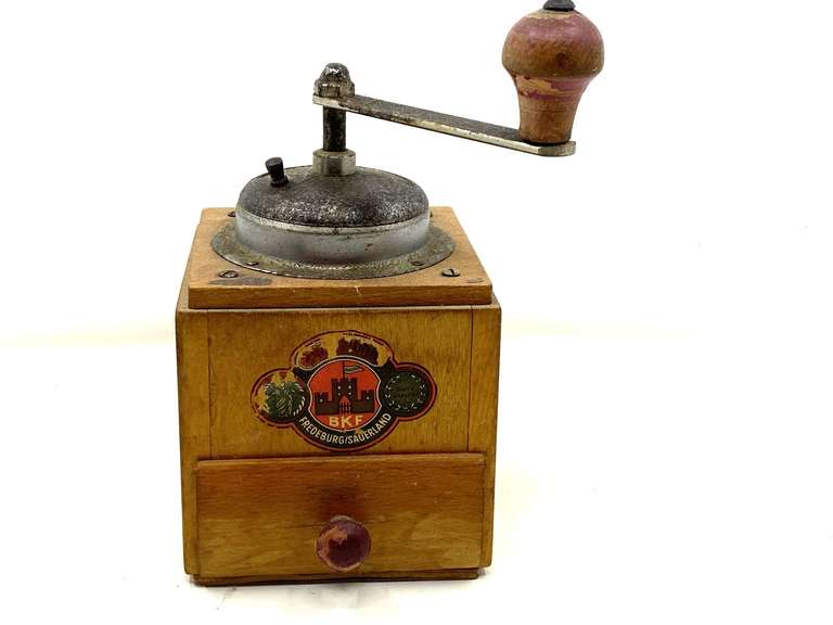 LR… Vintage German hand crank coffee grinder with wood base, see pictures for details. image