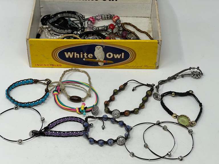 Cigar box filled with lovely ladies fashion estate bracelets, see pictures for details. image