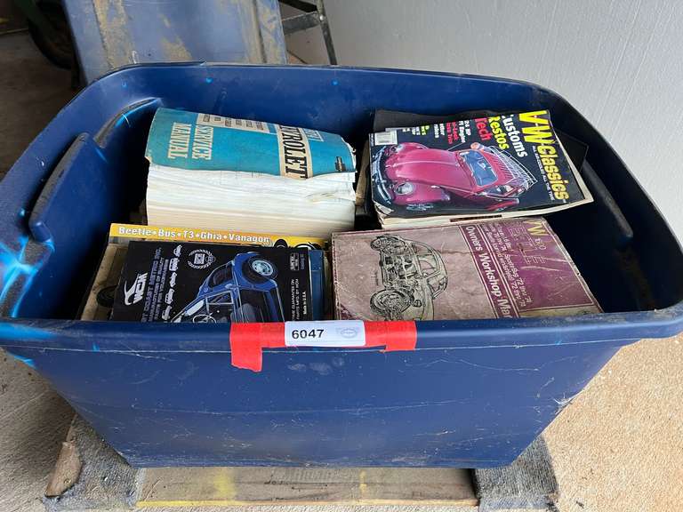 Tub of assorted auto manuals, also comes with a furniture dolly, see pictures for details. image
