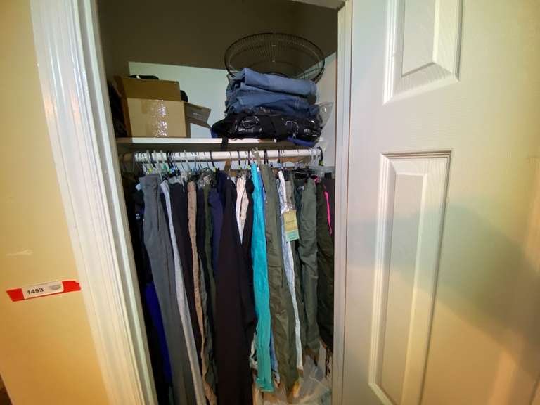 BR1…Closet lot marked 1493, includes all content of assorted clothing and more. See pictures for details. image
