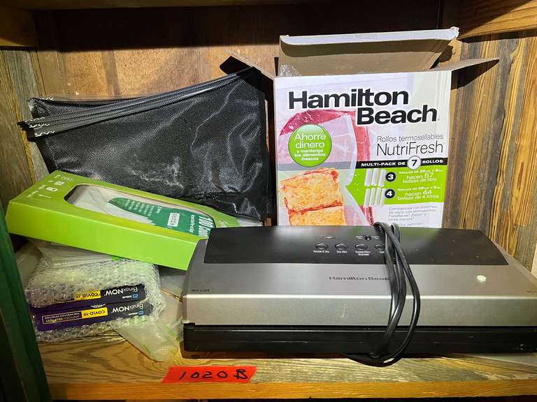 LR… Shelf lot marked 1020B, includes a Hamilton Beach vacuum sealer, with accessories, see pictures for details. image