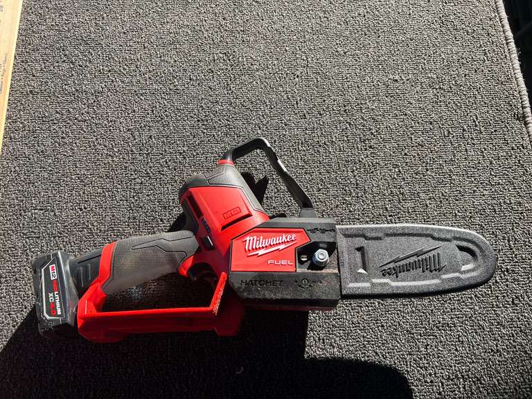 Milwaukee battery powered pruning saw, no charger, see pictures for details. image