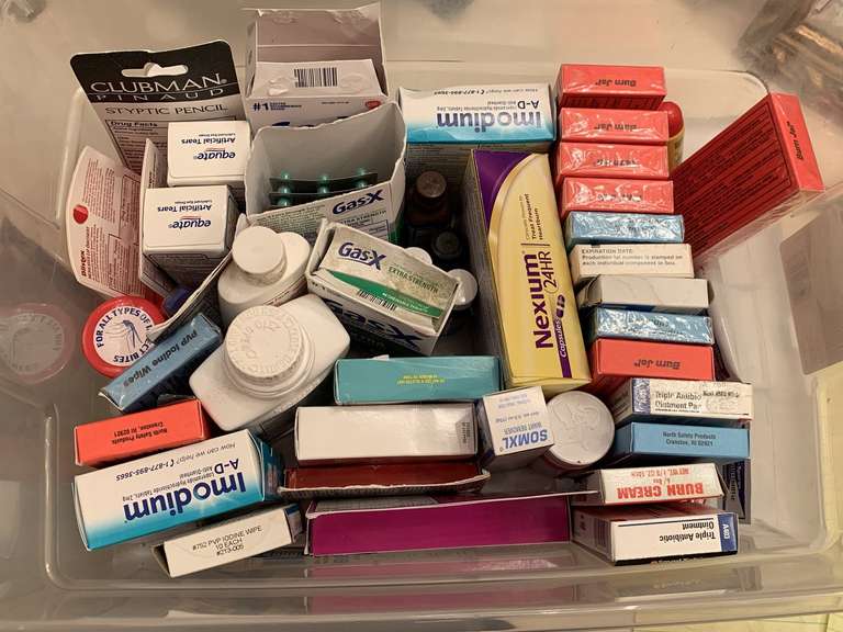 CRATE FULL OF VARIOUS MEDICINES TO INCLUDE BURN GEL, IMODIUM, GAS X, NEXIUM & MORE - CRATE W/ LID INCLUDED - UP HALL BATH CLOSET image