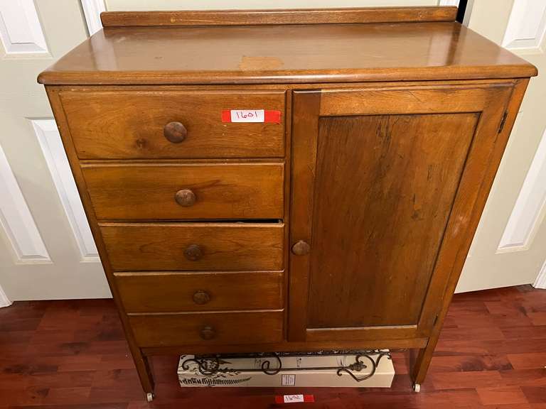 BR4… Vintage children’s nursery chifforobe, with content, has five drawers with side cabinet, and wooden wheels. See pictures for details. image
