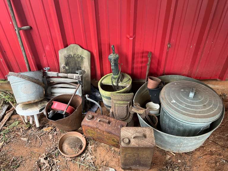 Variety lot to include Wash tub, gas cans, ringer, well pump image