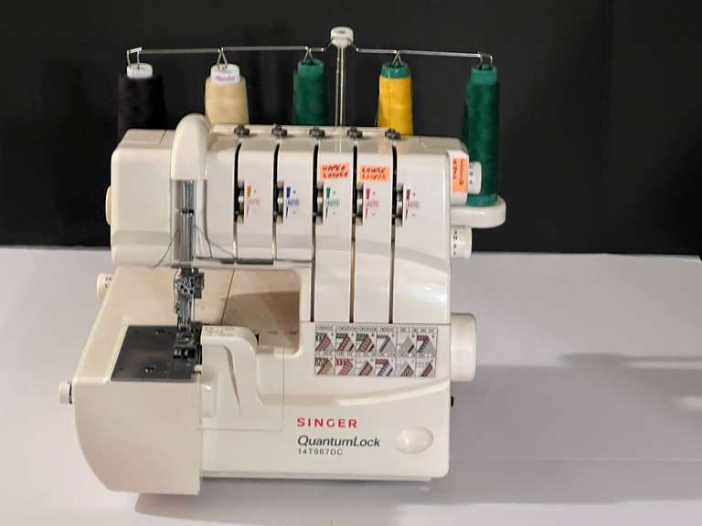 BR4… Singer Quantum Lock 14 T967 DC serger, DOES HAVE POWER cord, working condition unknown, comes with workbook, see pictures for details. image