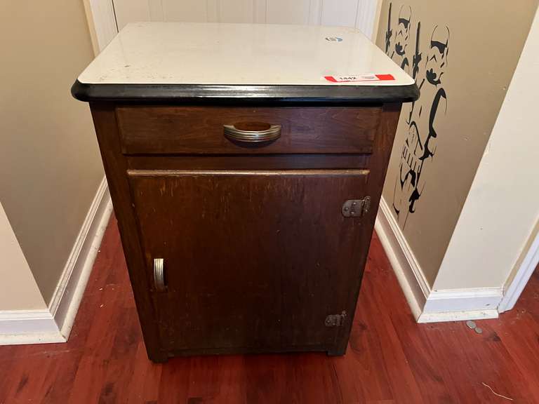 BR1..Wooden one drawer, one door cabinet with enamel metal top, see pictures for details. image