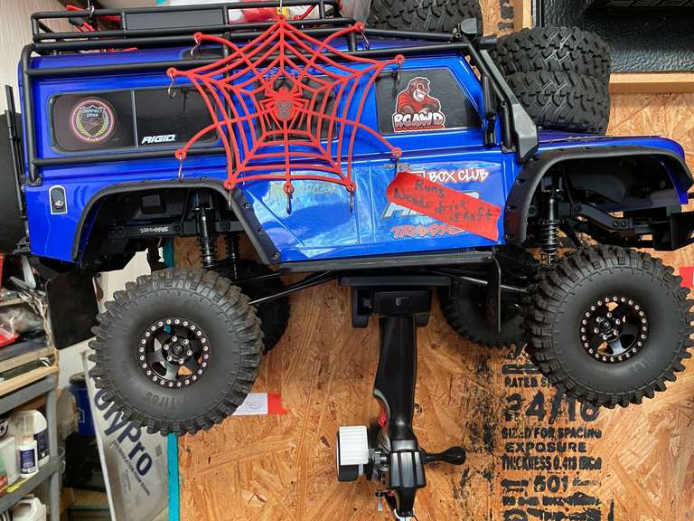 Radio control car, seller states runs but needs a driveshaft, comes with controller, and mount, see pictures for details. image