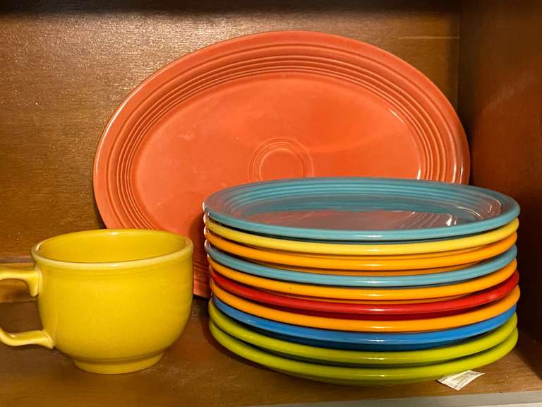 KIT… Shelf lot marked 1135 to include small Fiestaware dinner plates, platter, and more. See pictures for details. image
