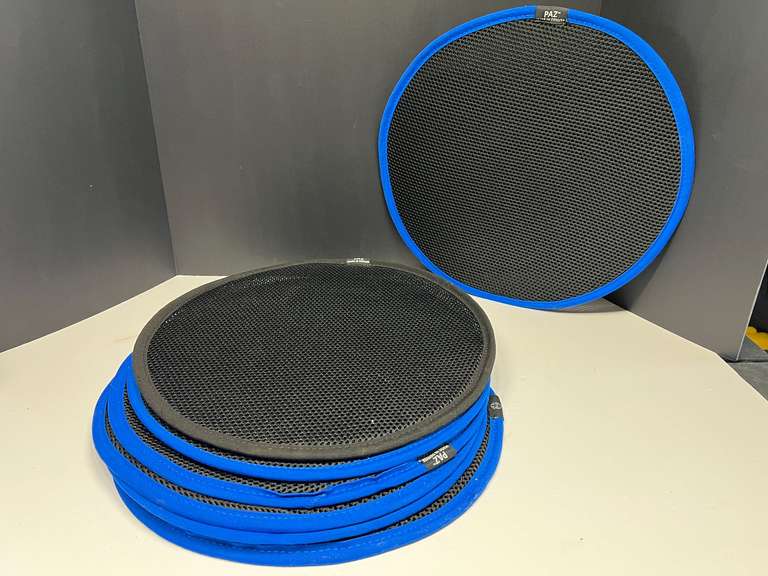Round mesh screens, approximately seven pieces, believed to be a type of filter or noise reducer, see pictures for detail details. image