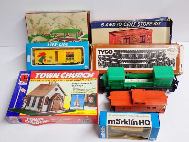 Mixed Lot of Model Train Cars, Track, and Building Kits image