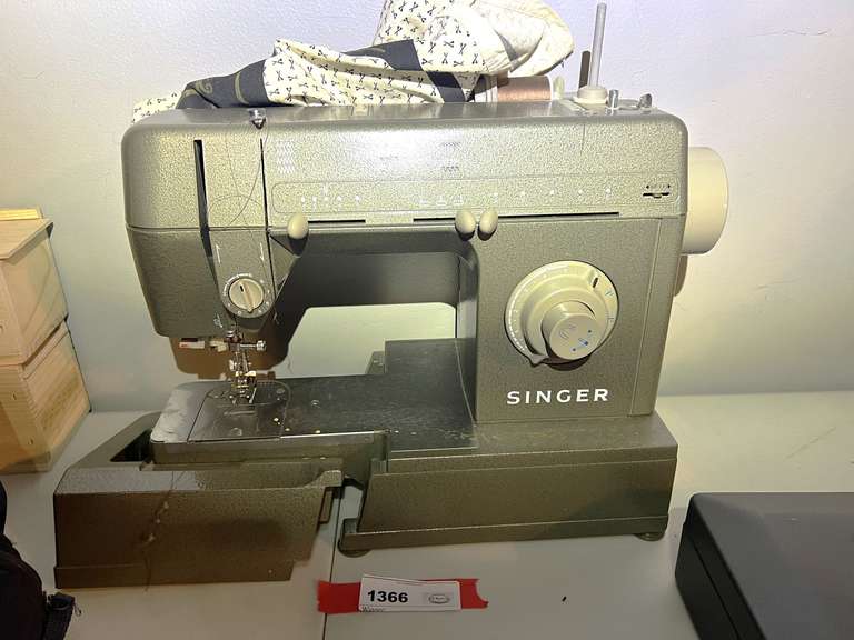DEN…Singer heavy duty sewing machine, working condition unknown, see pictures for details. image