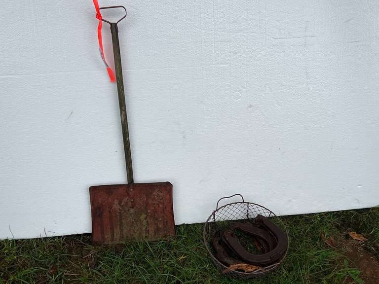 Vintage small Childs shovel and four horseshoes image