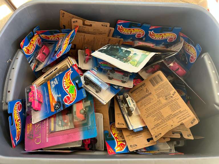 Tub of assorted Hot Wheels cars, still new in the package, see pictures for details. image