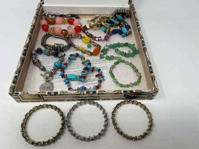 Collectible cigar box filled with assorted ladies fashion estate bracelets, see pictures for details. image