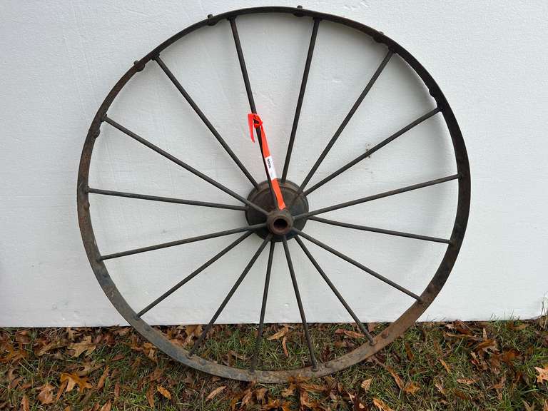 Antique metal wagon wheel image