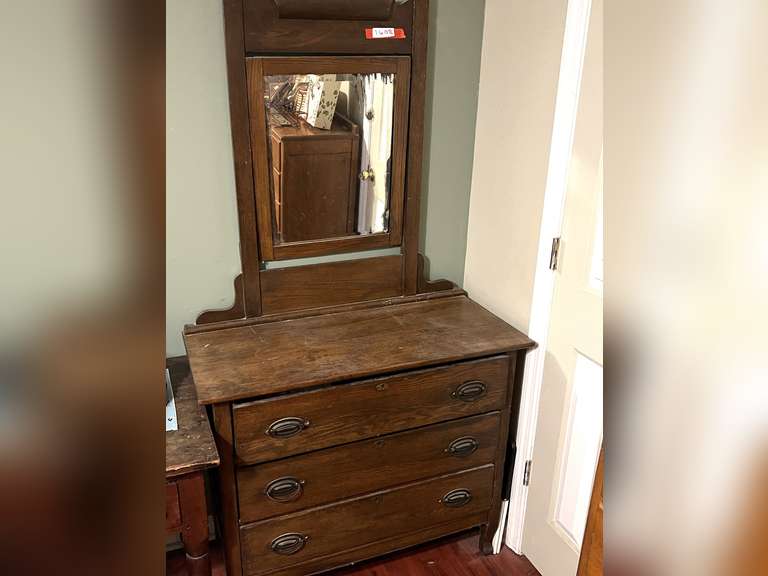 BR4… Vintage/antique three drawer chest of drawers, has a tilt mirror, items that may be seen in pictures are sold in separate lots, see pictures for details. image