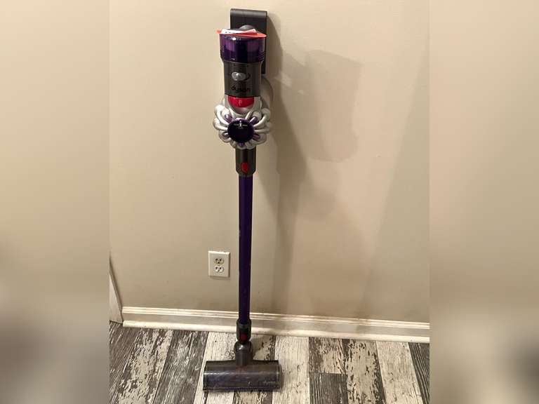 BR2… Dyson battery powered light duty vacuum cleaner, does power up, needs charging cord, see pictures for details. image