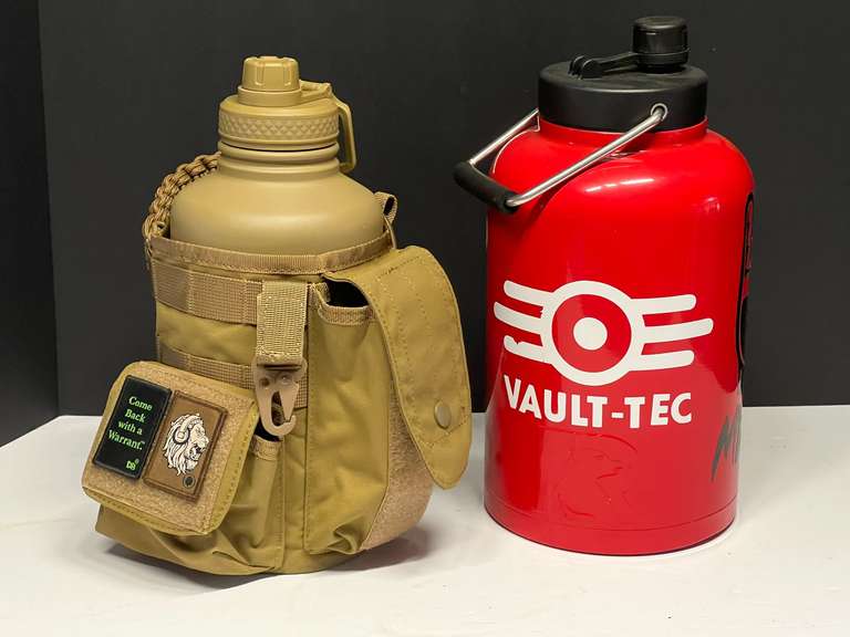 Large metal water containers, one comes with a canvas cover, two pieces total, see pictures for details. image