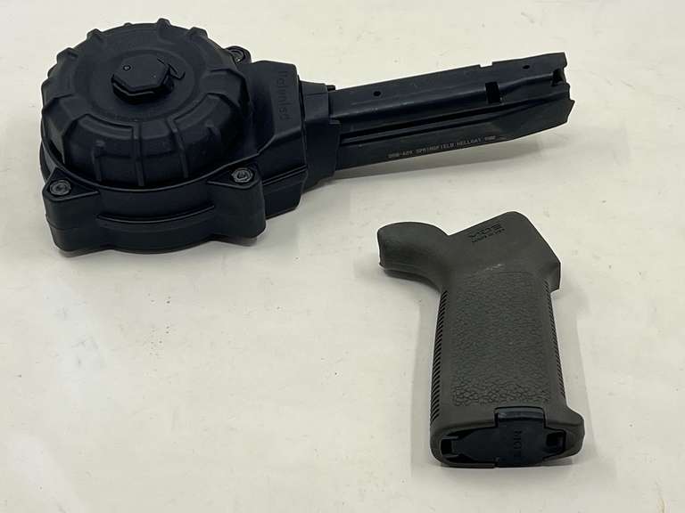 DEN…ProMag drum magazine, also includes a Magpul Moe grip, see pictures for details. image