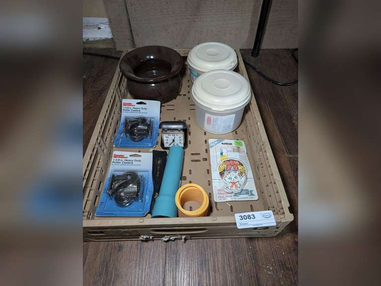 KNOCKDOWN CRATE AND CONTENTS INCLUDING VINTAGE WESTCLOX TRAVEL CLOCK, FLASHLIGHT, HEAVY DUTY ROLLER CASTERS, AND MORE image