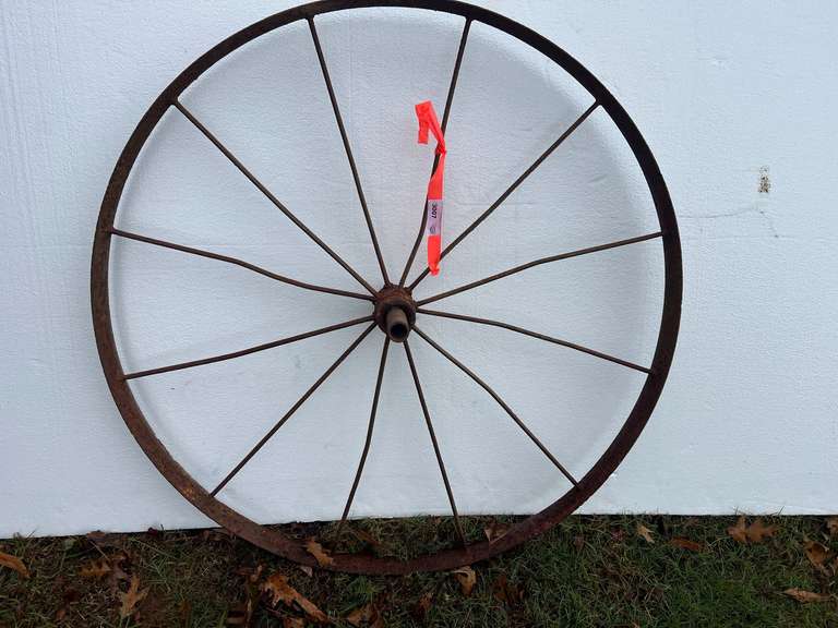 Antique metal wagon wheel image