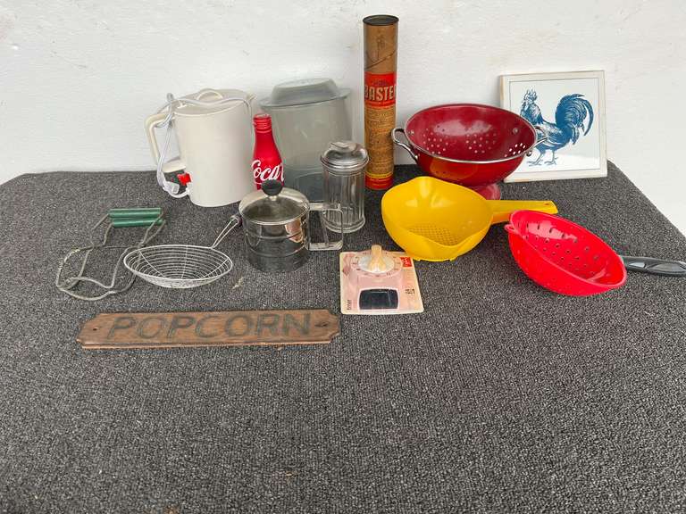Assortment of kitchen items to include an enamel colander, sifter, timer, vintage sugar jar, vintage baster, comes in original tube, and more. See pictures for details. image