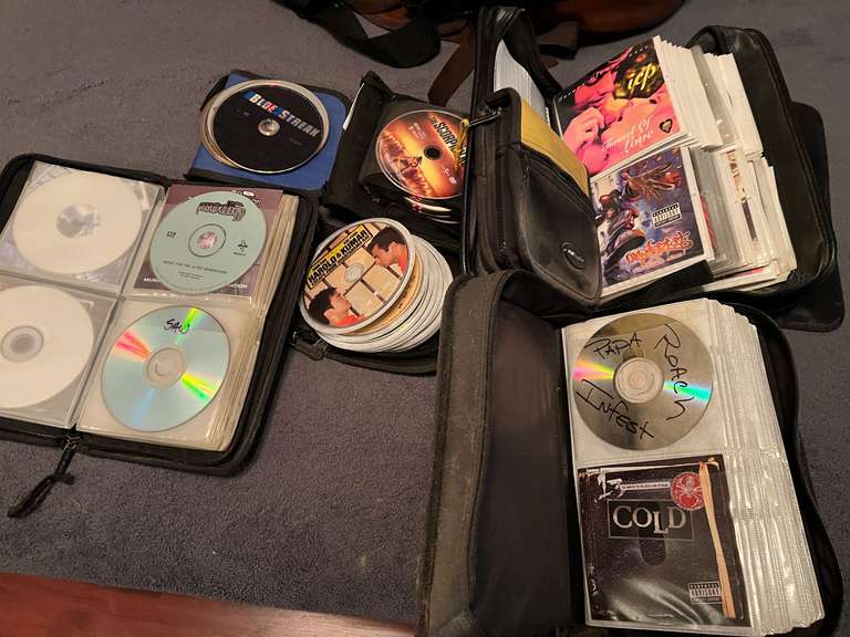 BR2…Large DVD/CD assortment, comes with carrying cases, see pictures for details. image