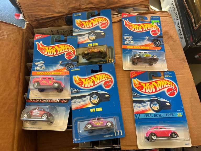 Large assortment of Hot Wheels, still in original packaging, see pictures for details. image