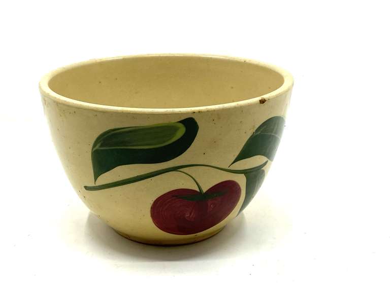 LR… Vintage mixing bowl, believed to be Watt pottery, has Apple pattern, there is a small chip on the rim, see pictures for details. image