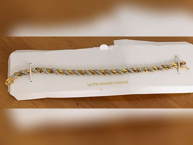 14K YELLOW GOLD OVER STERLING W/ 1/8 CARATS OF GENUINE DIAMOND TENNIS BRACELET 7" LONG 912.59 GRAMS) - CHECKOUT image