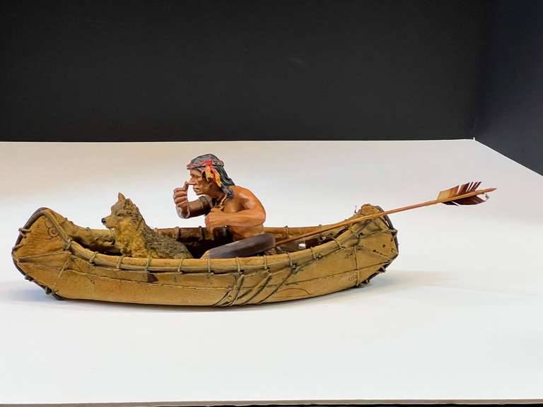 Native American in canoe with Wolf, see pictures for details. image