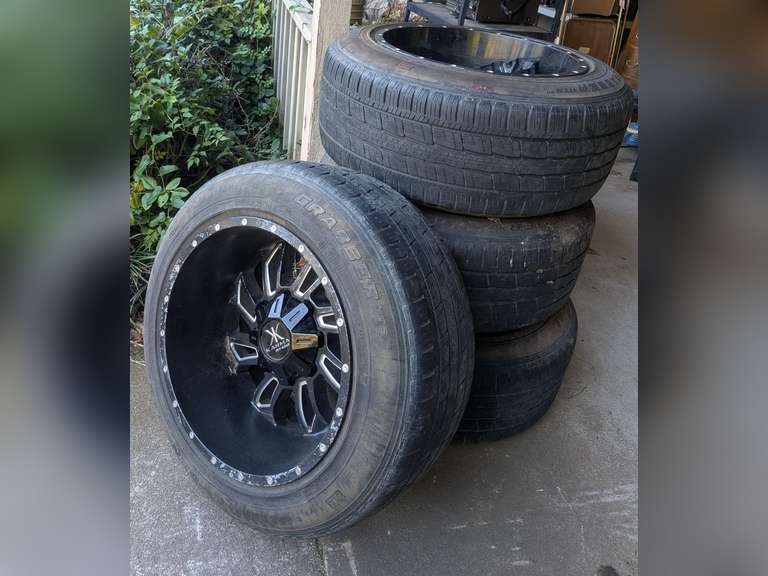 SET OF FOUR CUSTOM 20" LIGHT TRUCK WHEELS WITH GENERAL GRABBER HTS60  275/55R20 TIRES, FITS MULTIPLE BOLT PATTERNS INCLUDES CENTER CAPS image