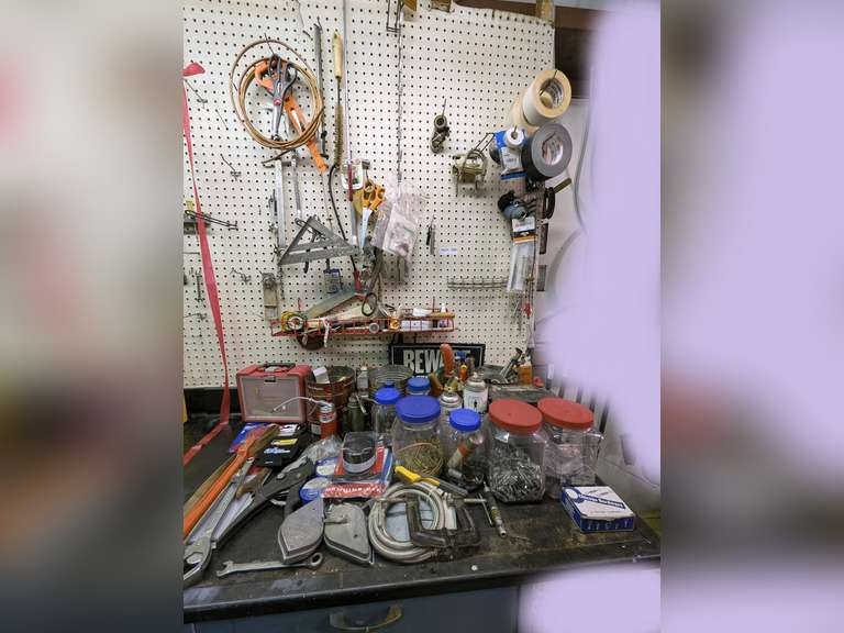 ALL ITEMS IN COUNTERTOP AREA AND HANGING ON PEGBOARD ABOVE INCLUDING FASTENERS, TOOLS, COPPER TUBING, HEAVY DUTY TAPE, BRACKETS, AND MORE image