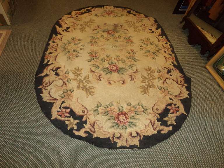 VINTAGE OVAL AREA RUG WITH FLORAL PATTERN image