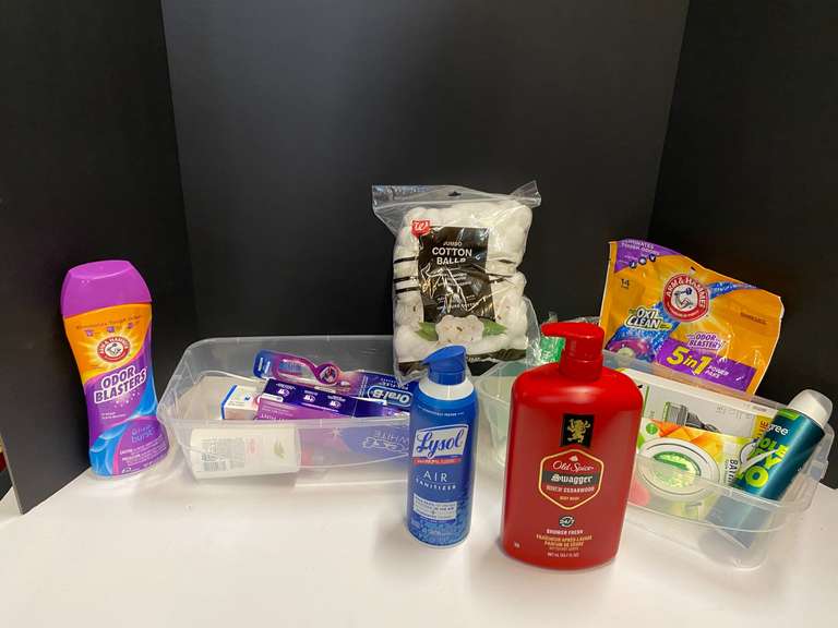 Shelf lot marked 6118 of assorted toiletries to include body wash, whole body deodorant, toothpaste, stick deodorant, and Moore. Tubs are not included, see pictures for details. image