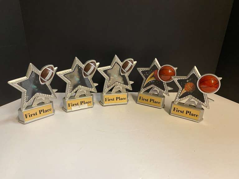 Small first place trophies for football and basketball, see pictures for details. image