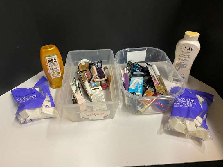 Assorted toiletries to include body wash, conditioner, assorted makeup, and more. Tubs are not included, see pictures for details. image