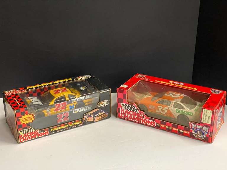 #22 and #35 NASCAR replicas, two pieces, 1/24 scale, comes with original boxes, see pictures for details. image