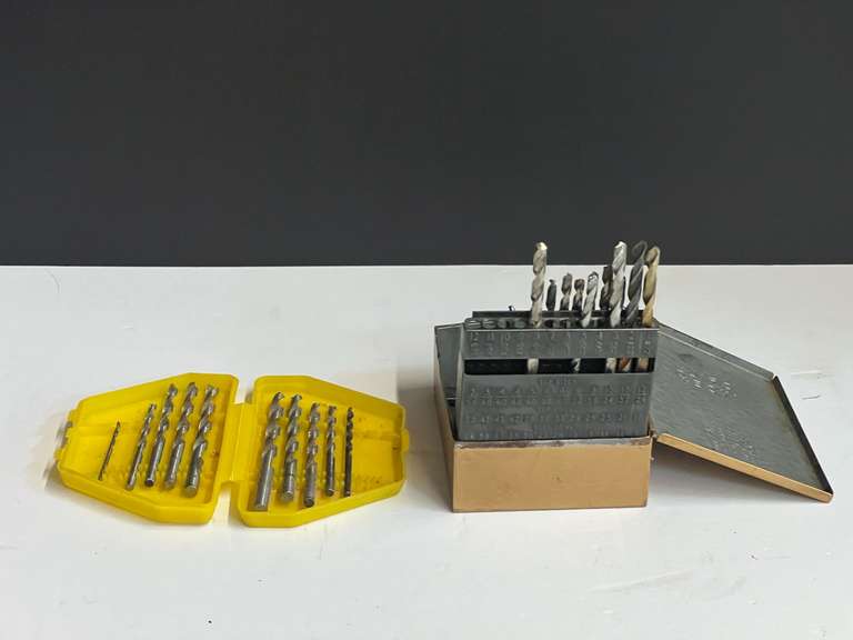 Assorted drill bits with storage cases, see pictures for details. image