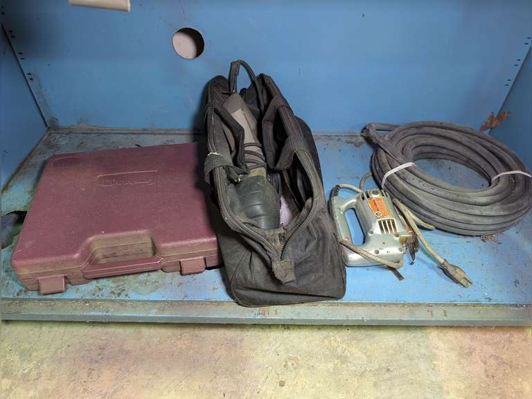 CONTENTS OF LOW CABINET MARKED 1039 INCLUDING CRAFTSMAN RECIPROCATING SAW, BLACK & DECKER JIGSAW, AIR HOSE, AND COMPANION TOOL SET image