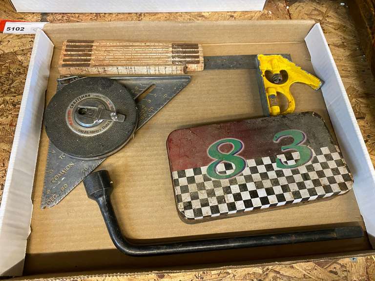 Small assortment of hand tools to include an Allen wrench set, speed square, 100 ft. tape, combination square, and more. See pictures for details. image