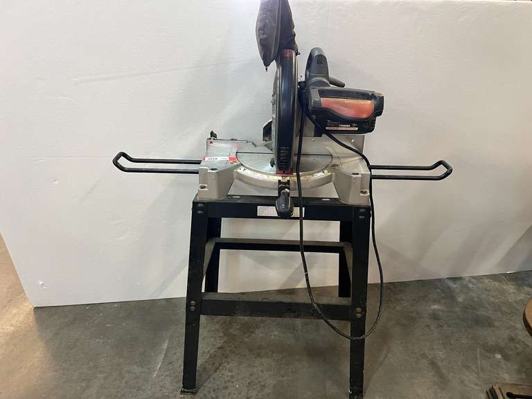 Craftsman 10” compound miter with stand, powers up, see pictures for details. image