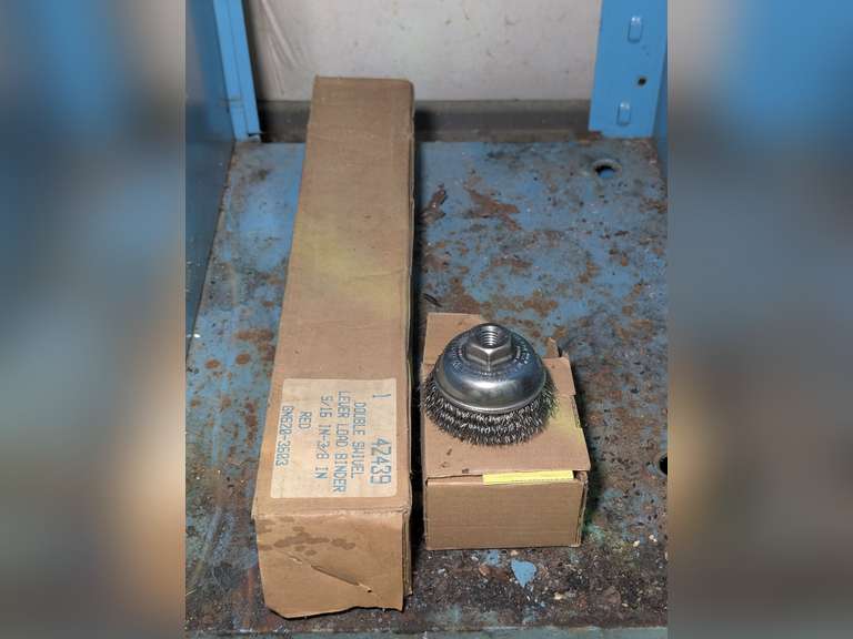 CONTENTS OF LOW CABINET MARKED 1041 INCLUDING WIRE BRUSH ADAPTER FOR DRILL AND FACTORY SEALED DOUBLE SWIVEL LOAD BINDER IN ORIGINAL BOX image