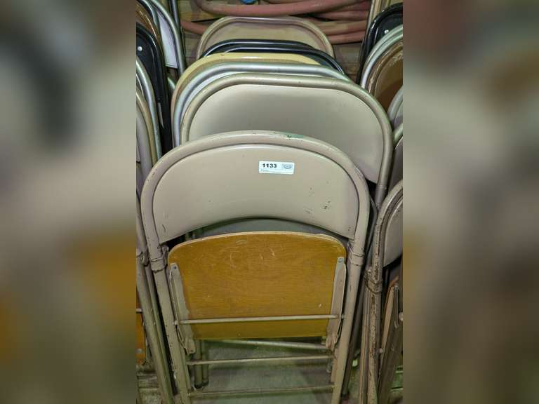 ROW OF METAL FOLDING CHAIRS MARKED 1133 image
