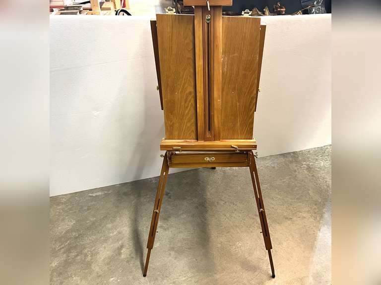 Portable art studio easel with art supplies, is missing a wing nut, see pictures or details. image
