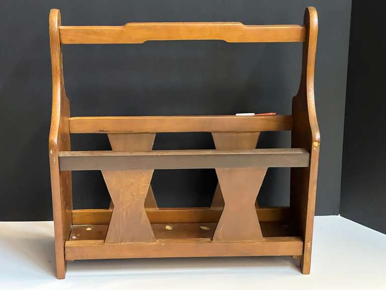 Small magazine rack, see pictures for details. image