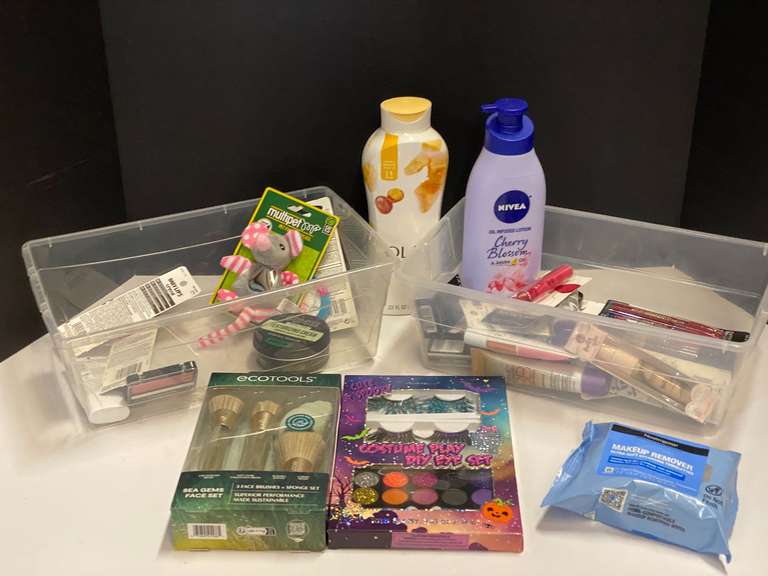 Shelf lot marked 6113 of assorted toiletries to include make up remover wipes, lotion, assorted makeup, and more. Tubs are not included, see pictures for details. ￼ image