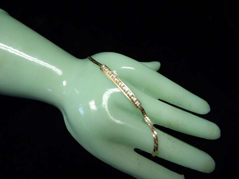 14 KARAT YELLOW GOLD BRACELET WITH SMALL DIAMONDS WEIGHING APPROXIMATELY 4.8 G image