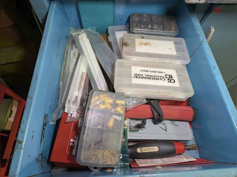 CONTENTS OF CABINET DRAWER MARKED 1042 INCLUDING DRILL BITS, A HUGE NUMBER OF UNUSED RECIPROCATING SAW BLADES, FASTENERS, AND MORE image